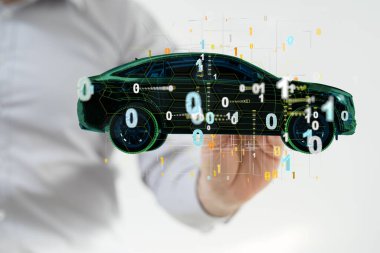 Bir elin yanında numaralar olan resimli bir araba.