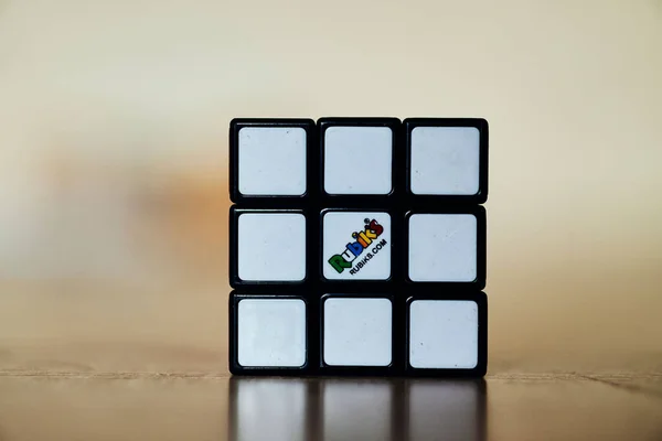 Solved Rubik Cube Standing Shiny Wooden Surface — Stock Photo, Image