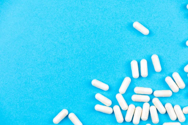 Górny Widok Tabletek Leków Niebieskim Tle Miejsca Kopiowania — Zdjęcie stockowe