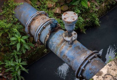 old blue water pipe installation, old pipe