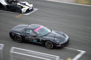 Chevrolet Corvette C5 running in the track