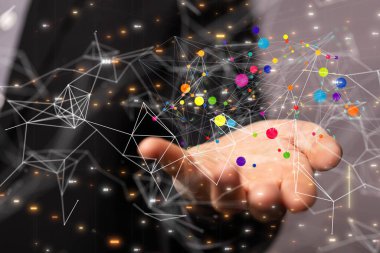 a shot of flying communication particles flying over hands