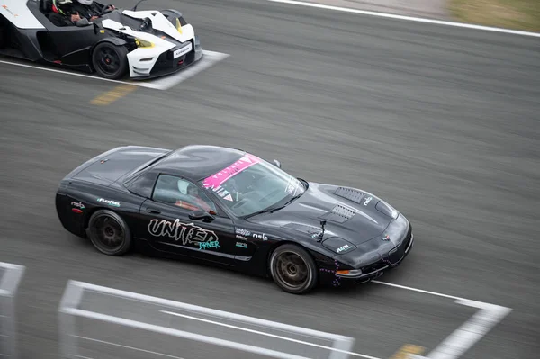 Chevrolet Corvette C5 running in the track