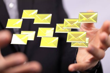 A 3D rendered  abstract shot, of a man's hand touching digital email and message icons on the web