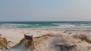 A beautiful shot of a sandy beach at sunset