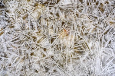 A top view of ice on the surface of a frozen lake