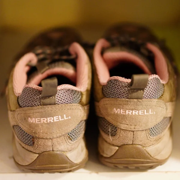 Closeup Pair Merrell Brand Shoes Shelf — Photo