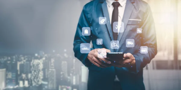 A shopper using his phone with floating digital icons