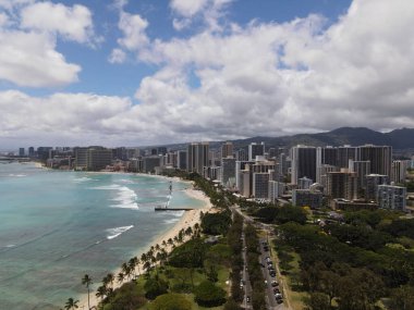 A beautiful view of the island of Oahu, Hawaii under the blue cloudy sky