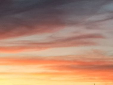 A dramatic view of golden clouds in Tunisia during sunset, Africa
