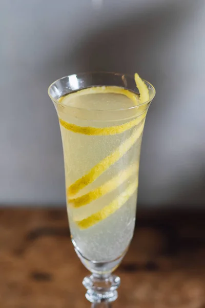 Close Lemon Twist Champagne Flute Table French Cocktail — Stock Photo, Image