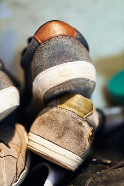 Vertical Closeup Sneakers Stacked Top Each Other Selected Focus — Stock Photo, Image