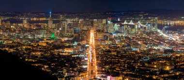 A panorama view of modern cityscape at night in San Francisco, CA, USA