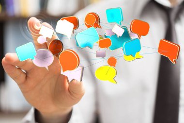 Bir elin yanında resimli baloncukların yakın çekimi