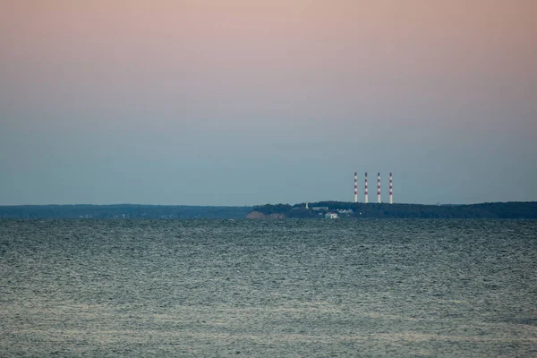 Scenic View Blue Seascape Smokestacks Sunset — Stockfoto