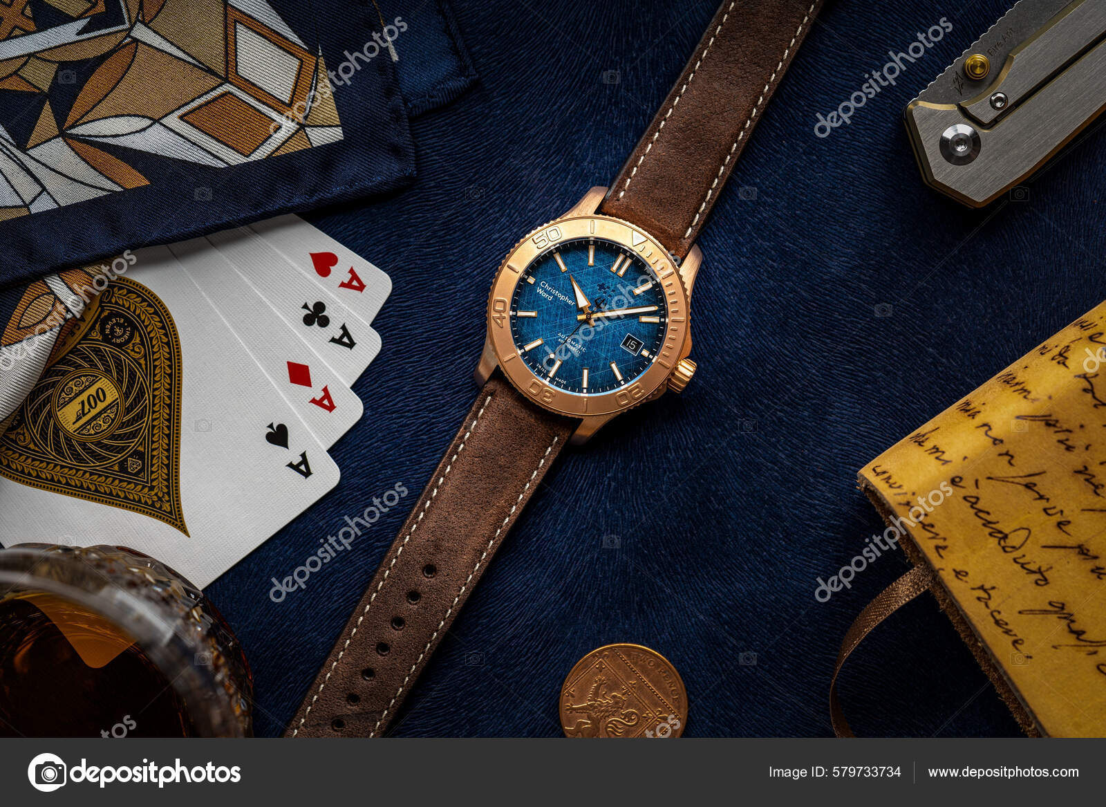 Top View Christopher Ward C60 Trident Bronze Watch Surrounded Playing wirestock creators 579733734