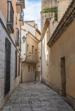 a vertical shot of small ancient street