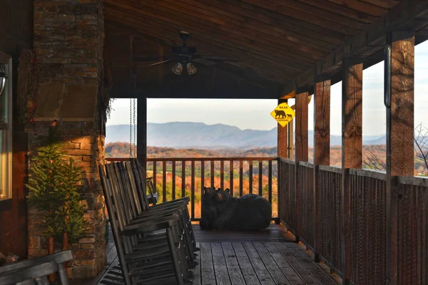 Balcony Rocking Chairs Bear Statues Mountains Background — Stok fotoğraf