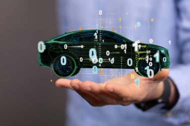 A hologram of a 3D rendered futuristic car with binary digits hovering over a person's hand