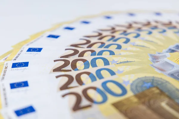背景として使用可能なパターンで200ユーロ紙幣の負荷 — ストック写真