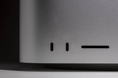 Macro closeup low key still life of modern new desktop computer system with USB and SD slots