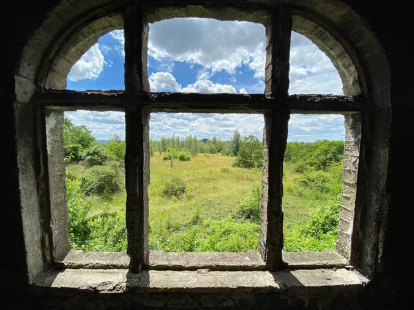 Closeup Old Window Stone Rails Green Field Blue Cloudy Sky — Stock Photo, Image