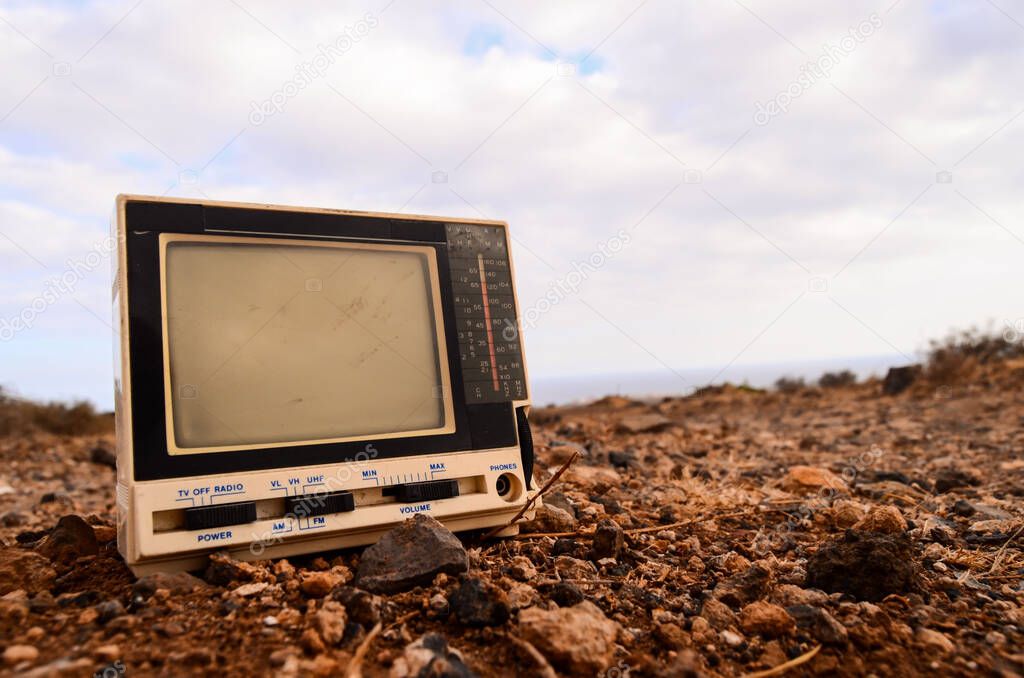 Broken Gray Television Abandoned in the Desert