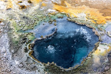 Colorful geysers in Yellowstone National Park, Wyoming USA clipart