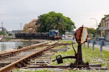 A view of train lines and oncoming train