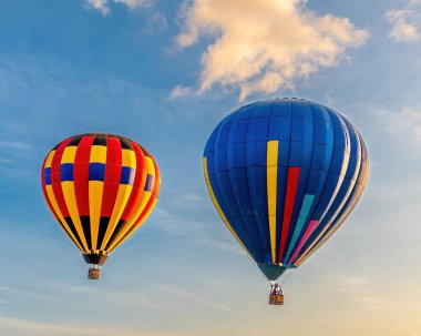 A beautiful shot of two hot air balloons in the sky