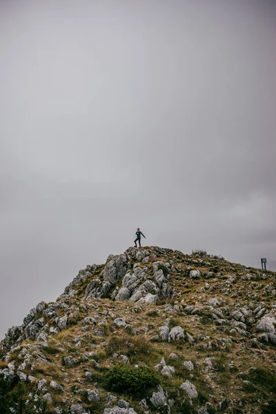 Vertical Shot Person Standing Mountain Peak Cloudy Sky Hiking Montenegro — Stok fotoğraf