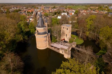 Aerial view of remains and tower of picturesque Duurstede castle with access bridge over the moat surrounding the fortress