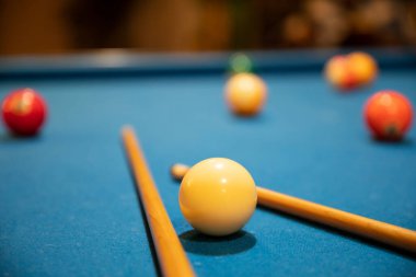 macro photography of Snooker, billiard balls, pool game table, Cue ball, striped ball, pool stick, black pool ball