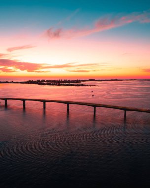 A beautiful colorful sunset and a sky reflection on the sea