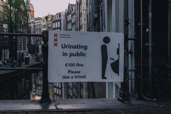 Urinating Sign Public Space Fine Street Amsterdam Netherlands — Stock Photo, Image