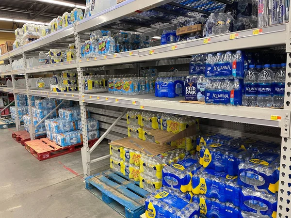 Augusta, Ga USA - 04 21 22: Walmart Retail store drinks water pallets