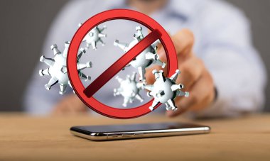 A 3D render of a red warning sign for a virus with a blurry background