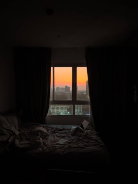 Work Space and View Of Sunlight Through Bedroom window