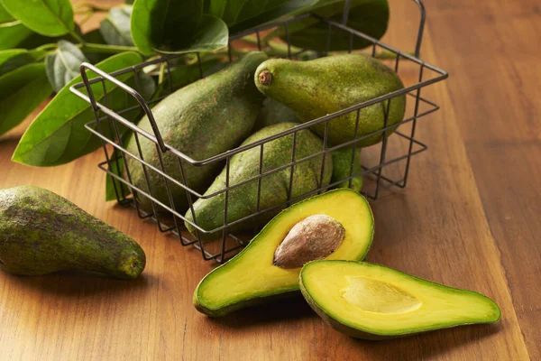 Closeup Shot Avocados Iron Basket — Stockfoto