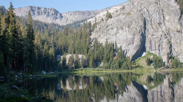 Mountains reflecting in a crisp alpine lake