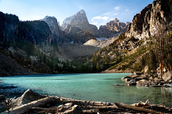 The blue mountain lake in Grand Teton National Park during the day