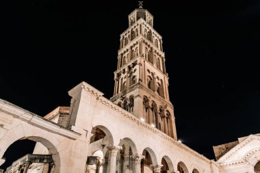 A low angle view of the Saint Domnius cathedral bell tower in Split, Croatia at night