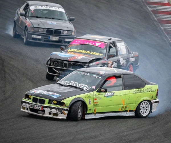 Green Bmw E36 drift at the Navarra circuit