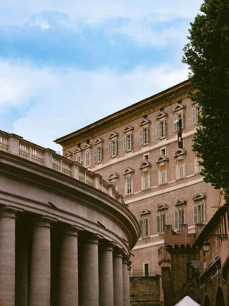 A vertical shot of the Apostolic Palace in Vatican City