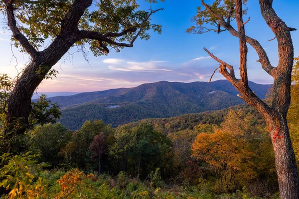 A beautiful landscape view of the Shenandoah National Park under dawn sky at sunrise in Virginia, United States