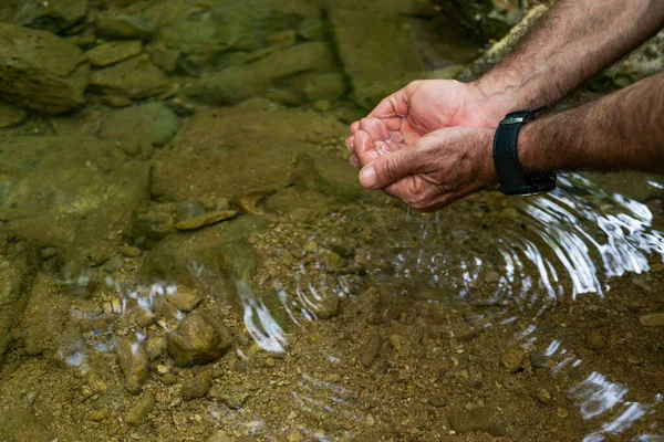 Man Hands Taking Water River Crystal Clear Water — kuvapankkivalokuva