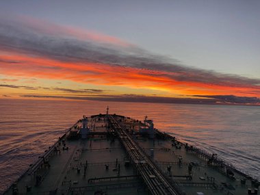 Beautiful sunset sky smooth sea transiting Yellow Sea winter seaon