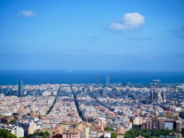 barcelona view from above, view from bunkers, on a summer day. sagrada familia and torre agbar