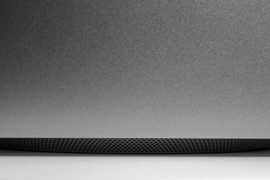 Almost abstract image of ventilation grid underneath modern new desktop computer system