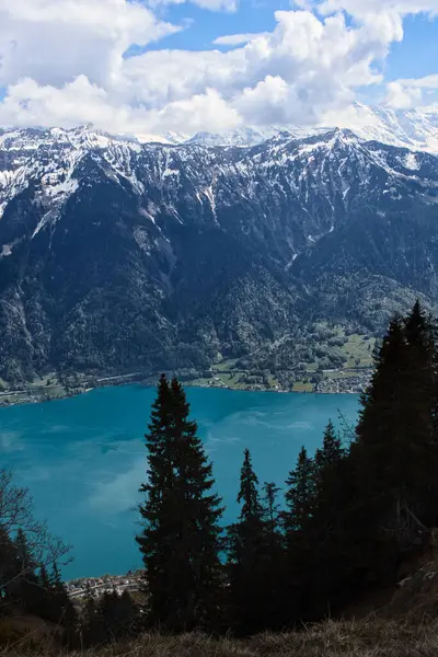 Vertical Shot Mountains Switzerland Blue Lake Clouds Sky — Zdjęcie stockowe